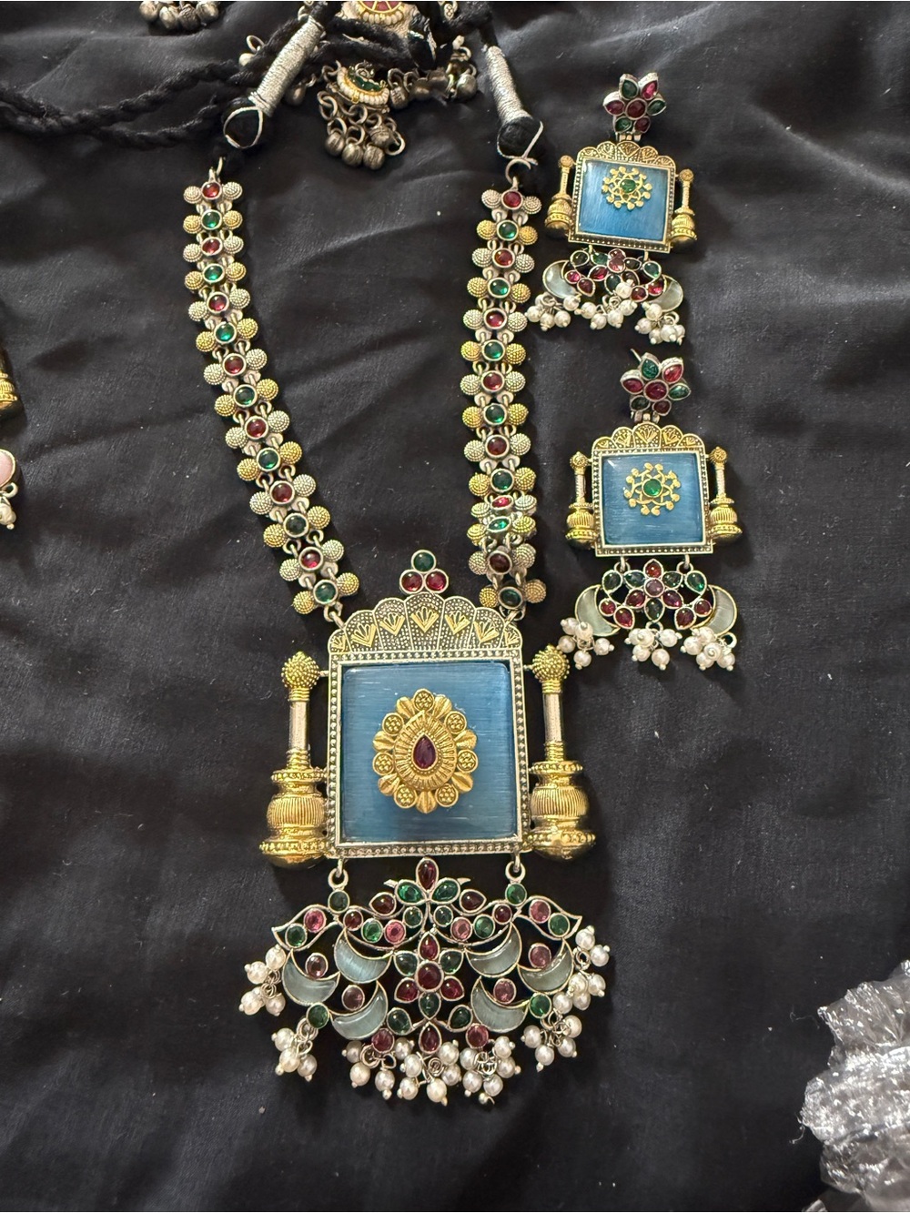 Traditional Gold-Tone Blue Pendant Necklace with Red and Green Accents